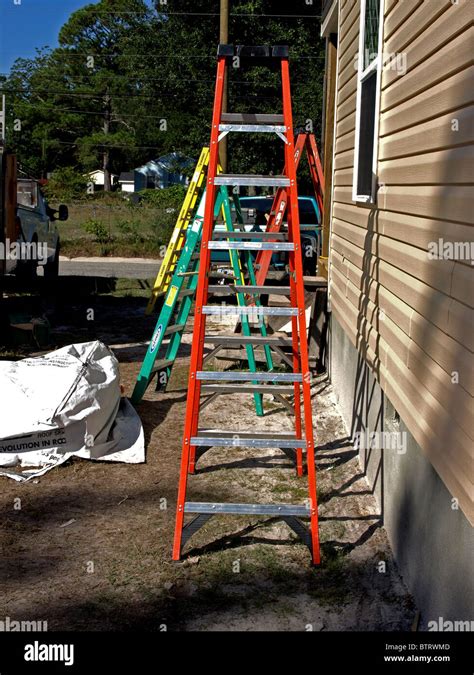 Construction Building Ladder Ladders Near Wall Of Residence House Vinyl