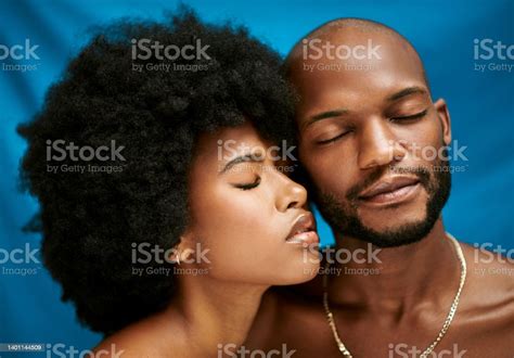 Closeup Of A Beautiful African Couple Standing With Their Eyes Closed Promoting Clear Skin Two