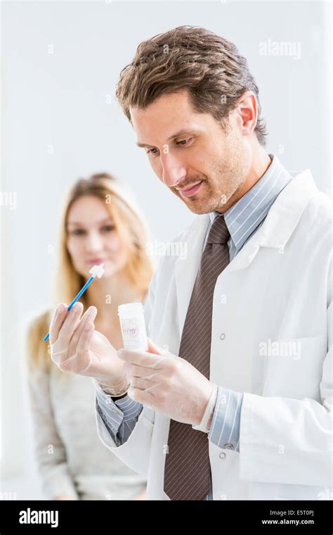 Gynecologist Performing A Cervical Smear Or Pap Test On A Female Patient Stock Photo Alamy
