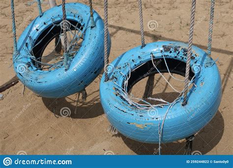 Swing In The Park Made Of Used Car Tires Stock Photo Image Of Iron