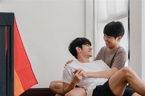 Free Photo Asian Gay Couple Lying And Hugging On The Floor At Home Young Asian Lgbtq Men