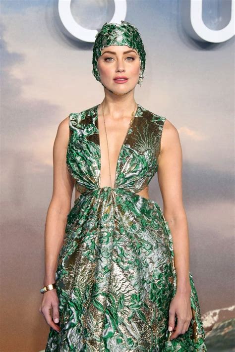 Amber Heard Wears Fashion Forward Swim Cap At Aquaman Premiere