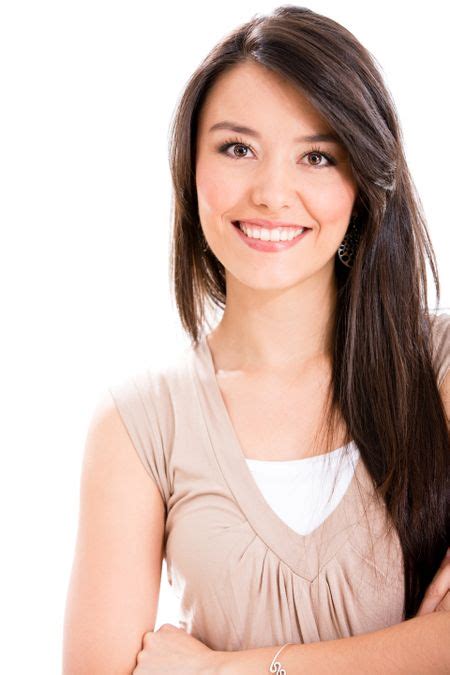 Beautiful Latin Woman Smiling Isolated Over A White Background