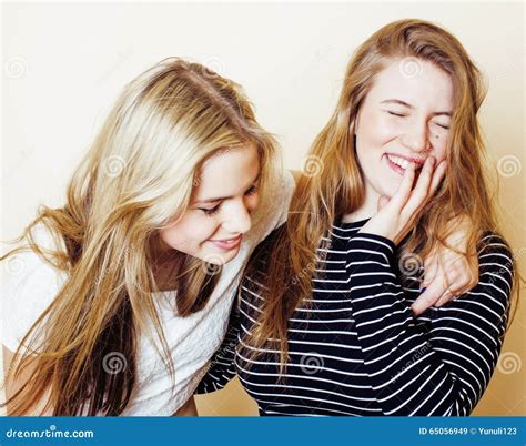 Two Blond Teenage Girl Fooling Around Messing Hair Stock Image Image Of Hugging Hipster 65056949