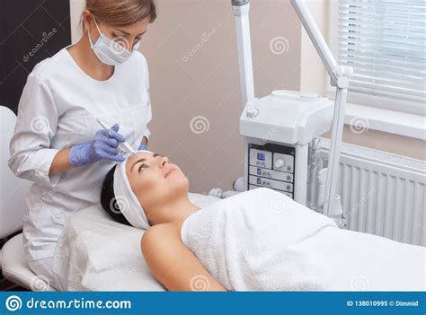 The Doctor Cosmetologist Makes The Procedure Treatment Of Couperose Of