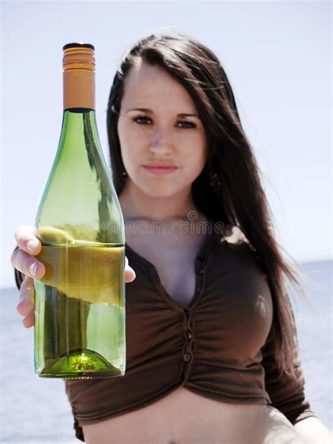 girl showing a bottle stock image image of portrait 16939363