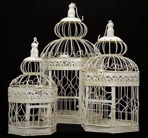 A beautiful and functional open design for this bird cage candle holder allows an elegant glow to shine through. Decorative "Antique" Bird Cages All 3 cages are the same ...