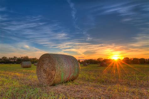 A Hay Bale Sunset Photograph By Tim Stanley Fine Art America