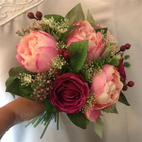 A Wedding Bouquet Of Silk Pink Peony And Wine Coloured Roses Wedding
