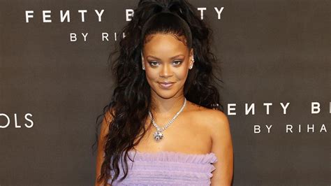 Rihanna Goes Girly In Pretty Lilac Dress At New Makeup Line Launch In