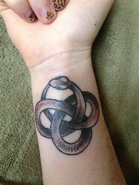 61 wonderful snake tattoos on leg. 18+ Snake Tattoos On Wrists
