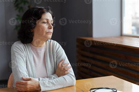 Sad Tired Ill Sick Lonely Disappointed Older Senior Woman Sitting At