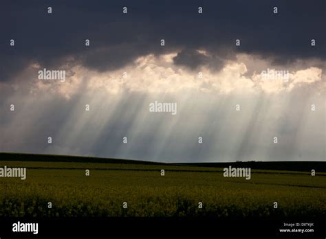 Sunrays Through Clouds Stock Photo Alamy