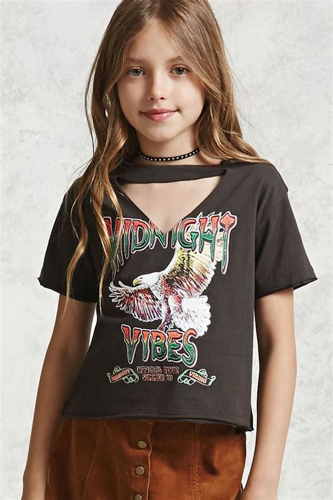 Forever 21 Girls A Knit Tee With Front And Back Graphics Such As