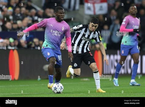 Miguel Almiron Of Newcastle United Looks To Challenge Yunus Musah Of Ac