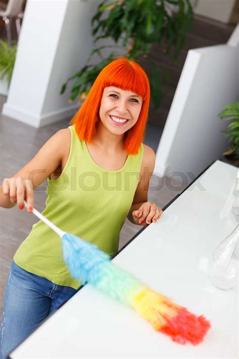 Red Hair Housewife Cleaning Her Home Stock Image Colourbox