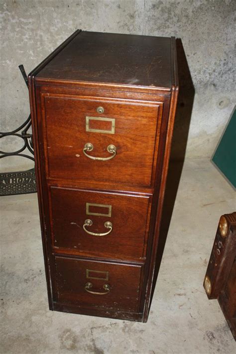 You will definitely be pleased with its stylish shape and this antique cherry finish file cabinet is a handy piece of furniture featuring rich wood finish and attractive design. ANTIQUE WOODEN 3 DRAWER FILING CABINET | eBay