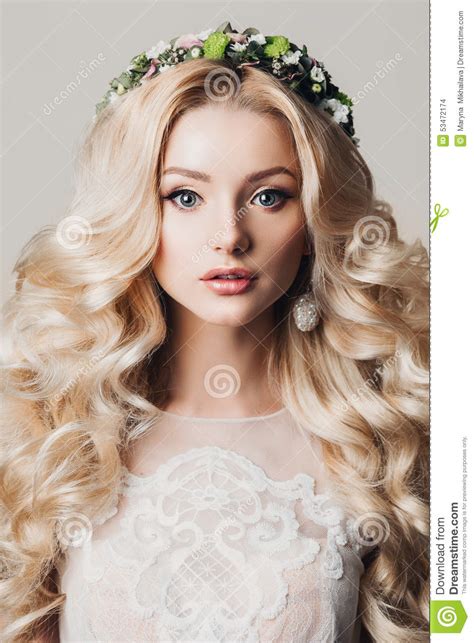 But, there is a fine line between your curls looking glamorous or like medusa's head of snakes. Portrait Of A Beautiful Young Blonde Woman With Long Curly ...