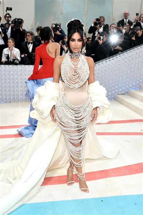 Kim Kardashian On Met Gala Red Carpet Nods To Playboy Cover In Pearls