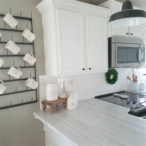 I put both of the charts next to each other towards the bottom of this post so you can compare them. Sherwin Williams Intellectual Gray Kitchen - Interiors By ...