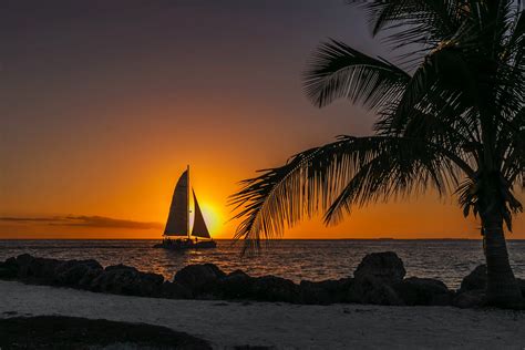 Sunset On A Gorgeous Beach With A Ship Sailing At Key West Usa Beach