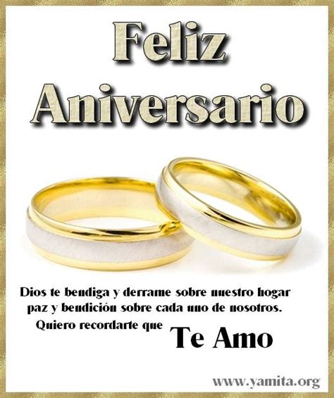Two Wedding Rings With The Words Feliz Aniversaro Written In Spanish