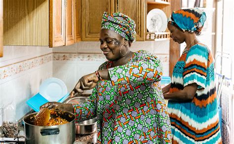 African Women Cooking By Stocksy Contributor Marco Govel Stocksy