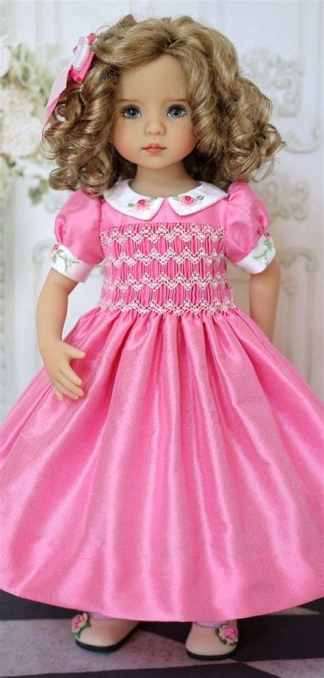 A Doll Wearing A Pink Dress And Shoes