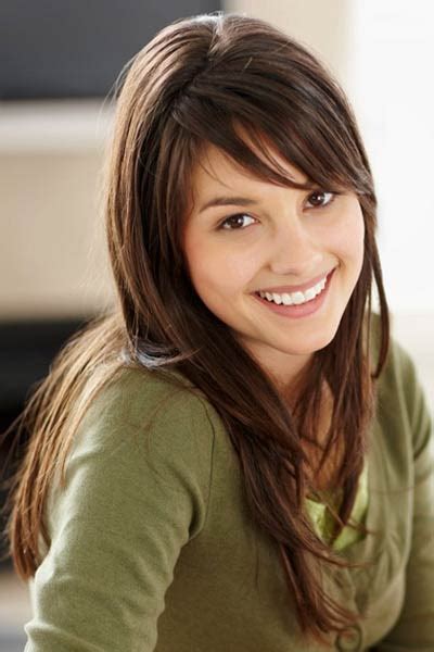 Straight long layered dark hair with electric blue colored bangs. Straight Layered Hairstyles