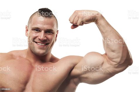 Happy Body Builder Flexing Biceps Stock Photo Download Image Now