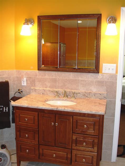 Upgrade your kitchen and bathroom with us today! Furniture Style Bathroom Vanity - Design Build Planners