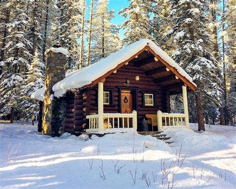 How Cute Is This Snow Covered Cabin Winter At Storm Mountain Lodge Is
