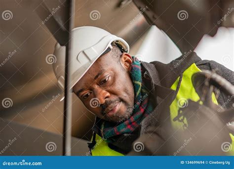 African Engineer At Work On Construction Site Stock Photo Image Of
