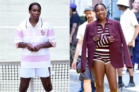 Venus Williams Poses In Front Of A Tennis Court In Pink And Maroon