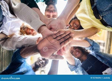 Young People Putting Their Hands Together Stock Photo Image Of