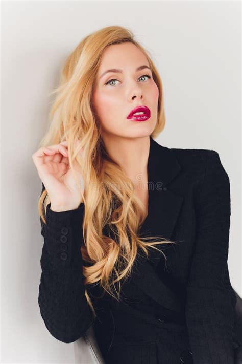 Blonde Business Woman In A Black Suit Stock Photo Image Of Colorful