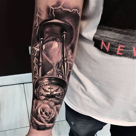 Awesome Black And Grey Tattoo Of Hourglass Motive Done By Tattoo Artist
