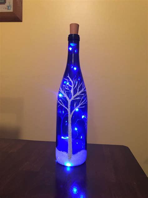 Handpainted Lighted Blue Wine Bottle with Birch trees and cardinals