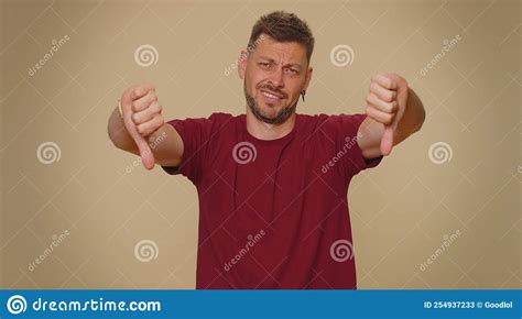 Upset Man Showing Thumbs Down Sign Gesture Expressing Discontent