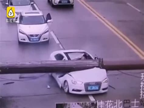 Driver Miraculously Survived After His Car Smashed By Falling Crane On Road