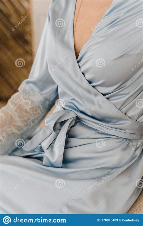 A Girl In A Silk Robe Meets Morning Woman Unties The Ties Of A Blue