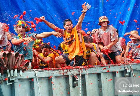 Revellers Throw Tomatoes From A Stock Photo