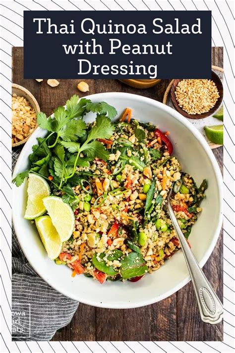 Thai Quinoa Salad With Peanut Dressing In A White Bowl On A Wooden Table
