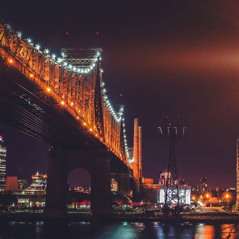 Nf75 Bridge Night River City Lights Orange Flare Wallpaper