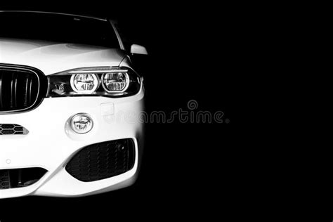 Headlight Of A Modern White Sport Car The Front Lights Of The Car