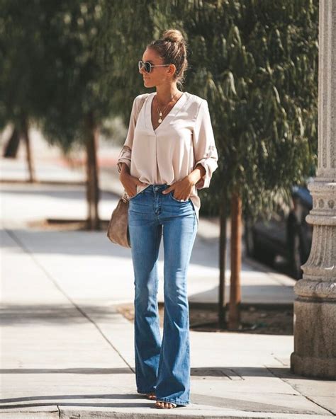 40 Outfits With Flare Jeans To Wear Right Now How To Style