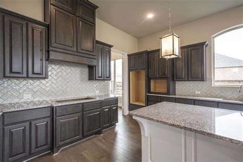 You will enjoy the beauty whether in your home or business. Kitchen in Highland Homes 296 Plan at 27526 Blackstone ...
