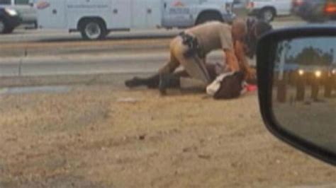 probe into la traffic officer beating woman news al jazeera