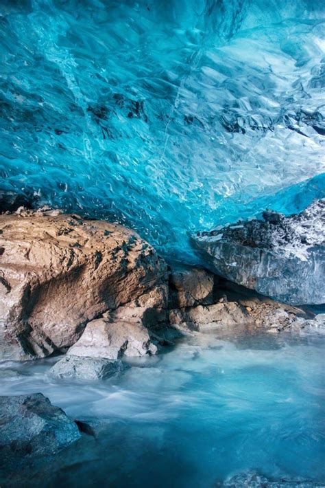 Photographing Inside Vatnajokull Waterfall Ice Cave Iceland