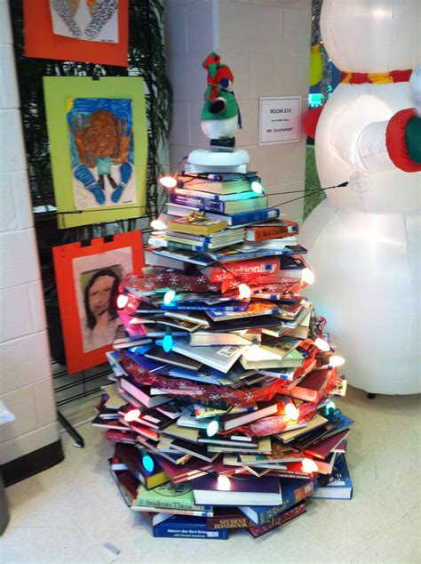 A Christmas Tree Made Out Of Books This Is In The Middle School Where